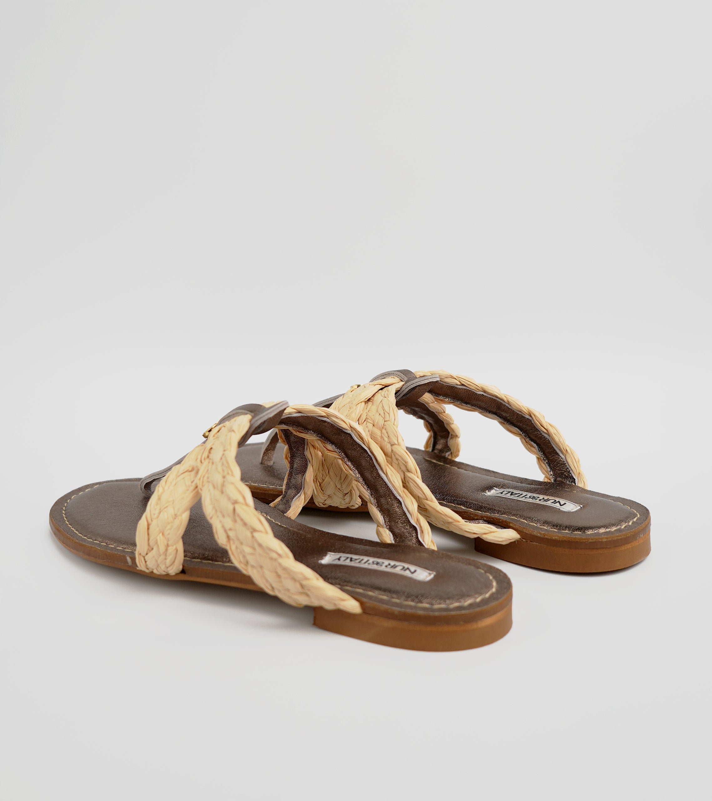 Pair of sandals with braided straps on a light gray background #color_siena bronze