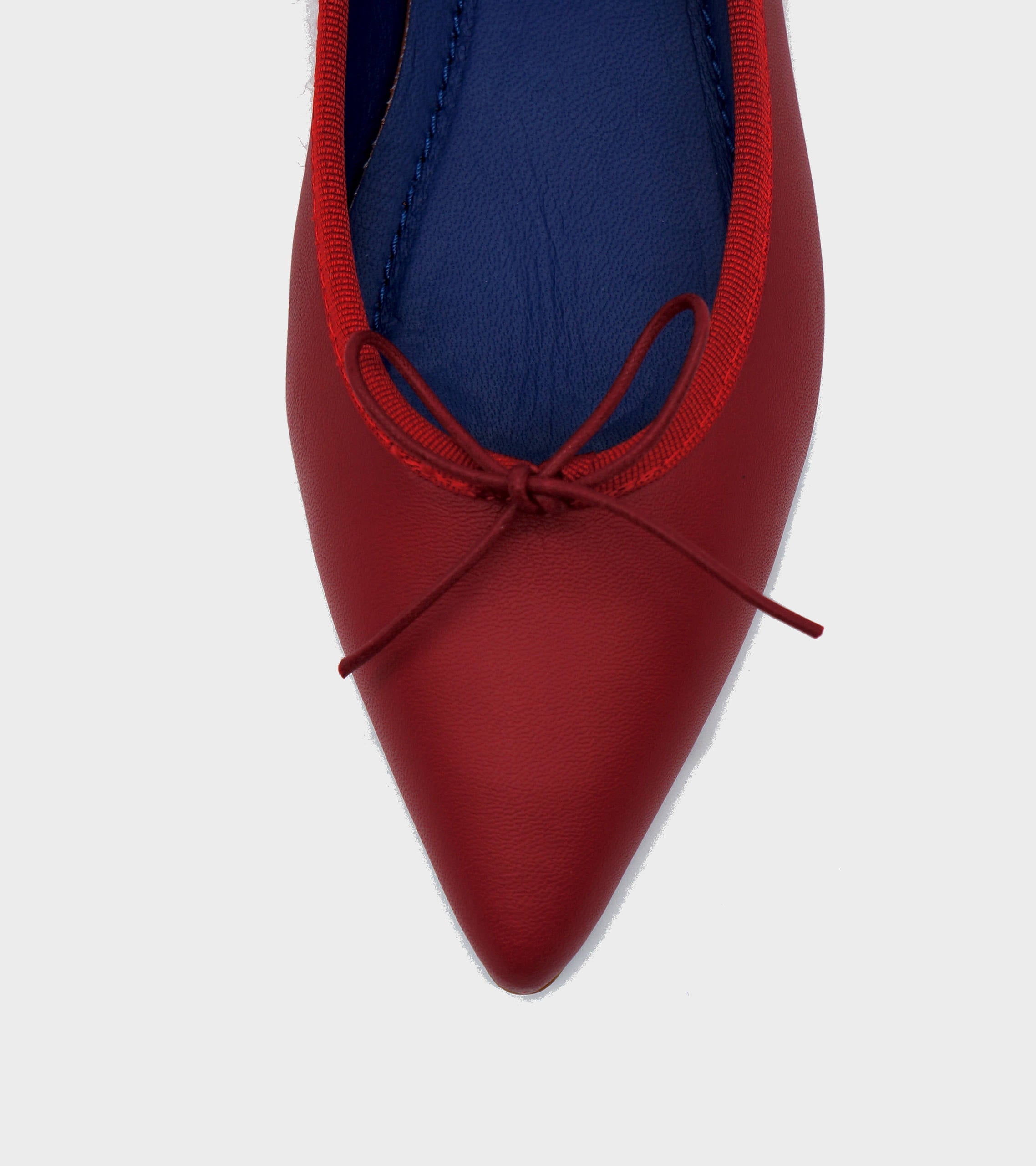 Detail of pointed-toe Isabella Nappa Flat, color RED #color_varese fire